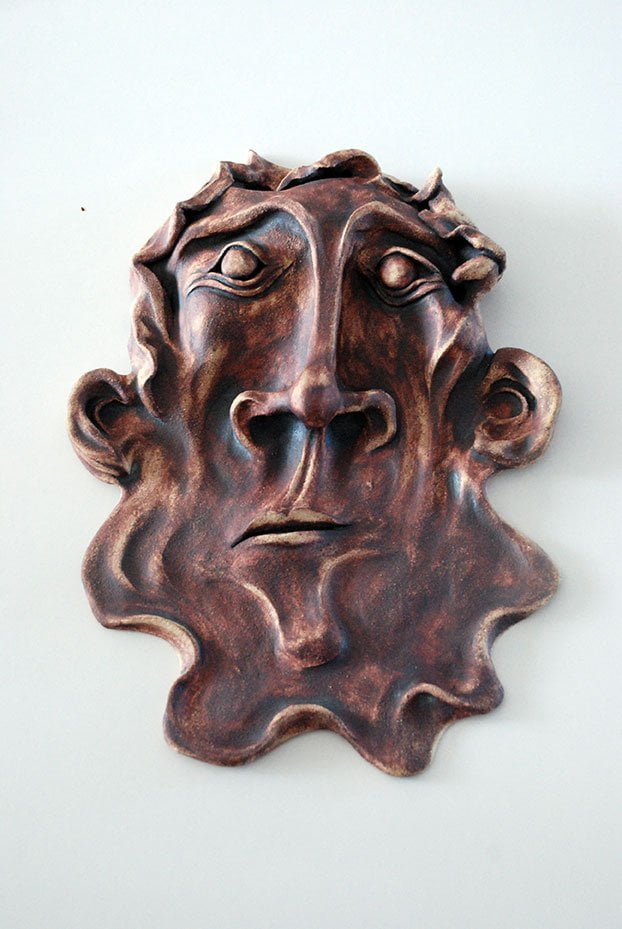 modern ceramics face sculpture